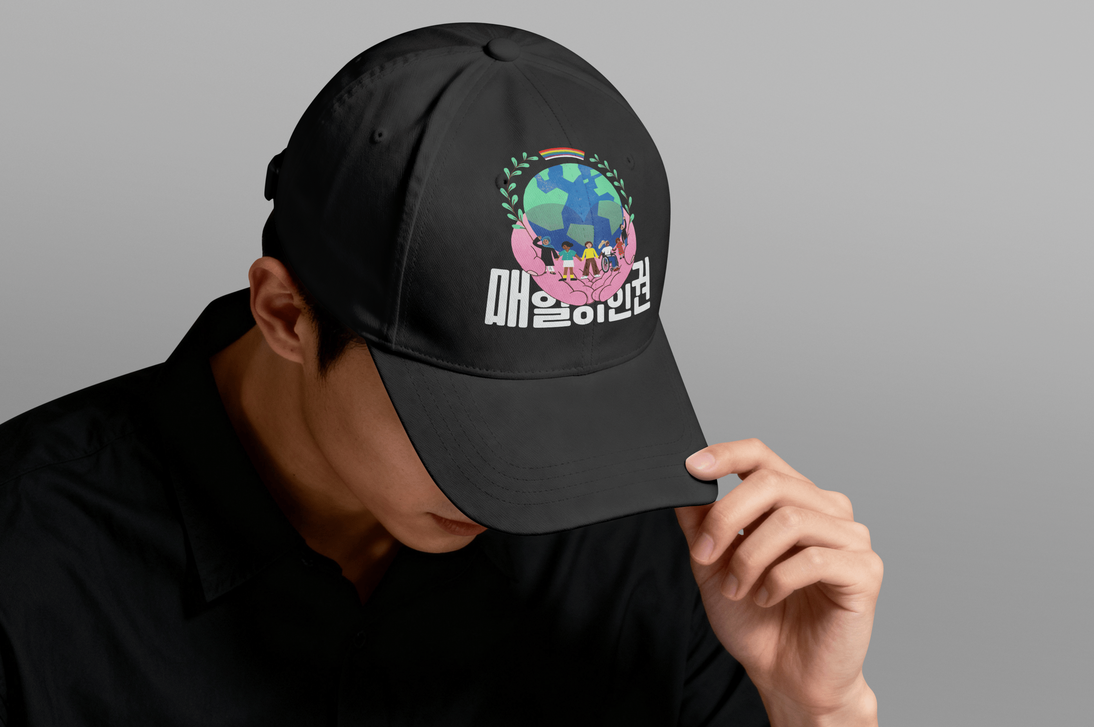 Graphic of a typography specimen showing the alphabet and numerals on top of a dark gray background.