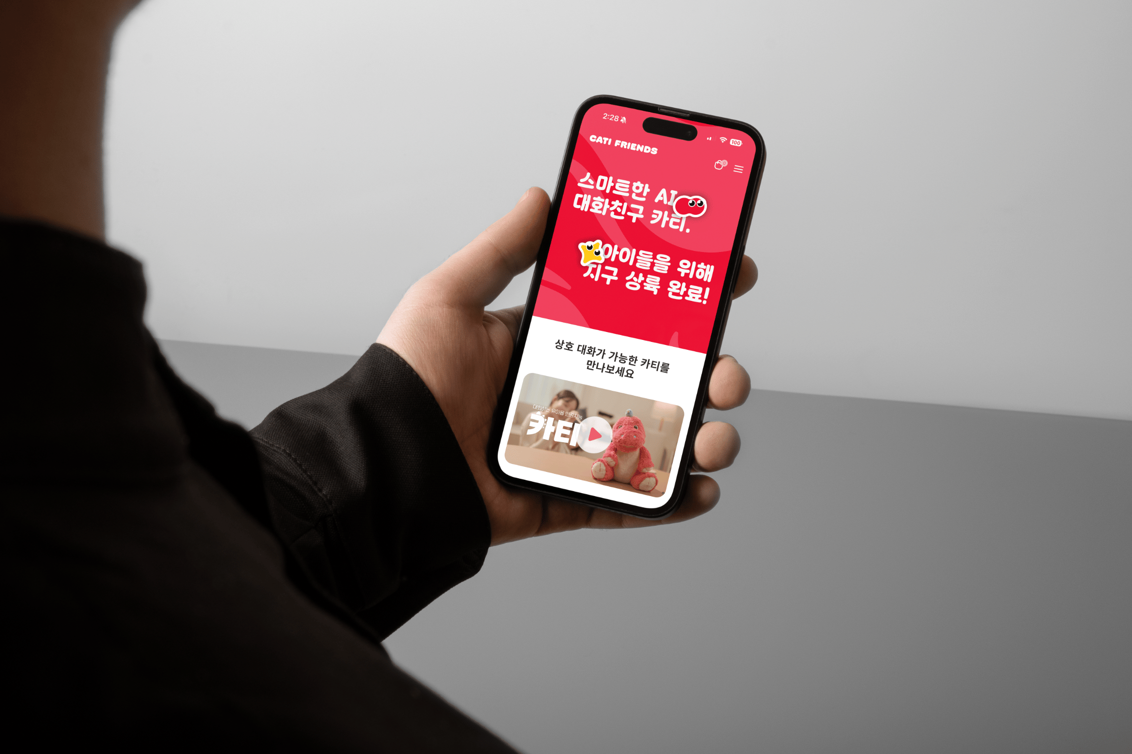 Graphic of a typography specimen showing the alphabet and numerals on top of a dark gray background.