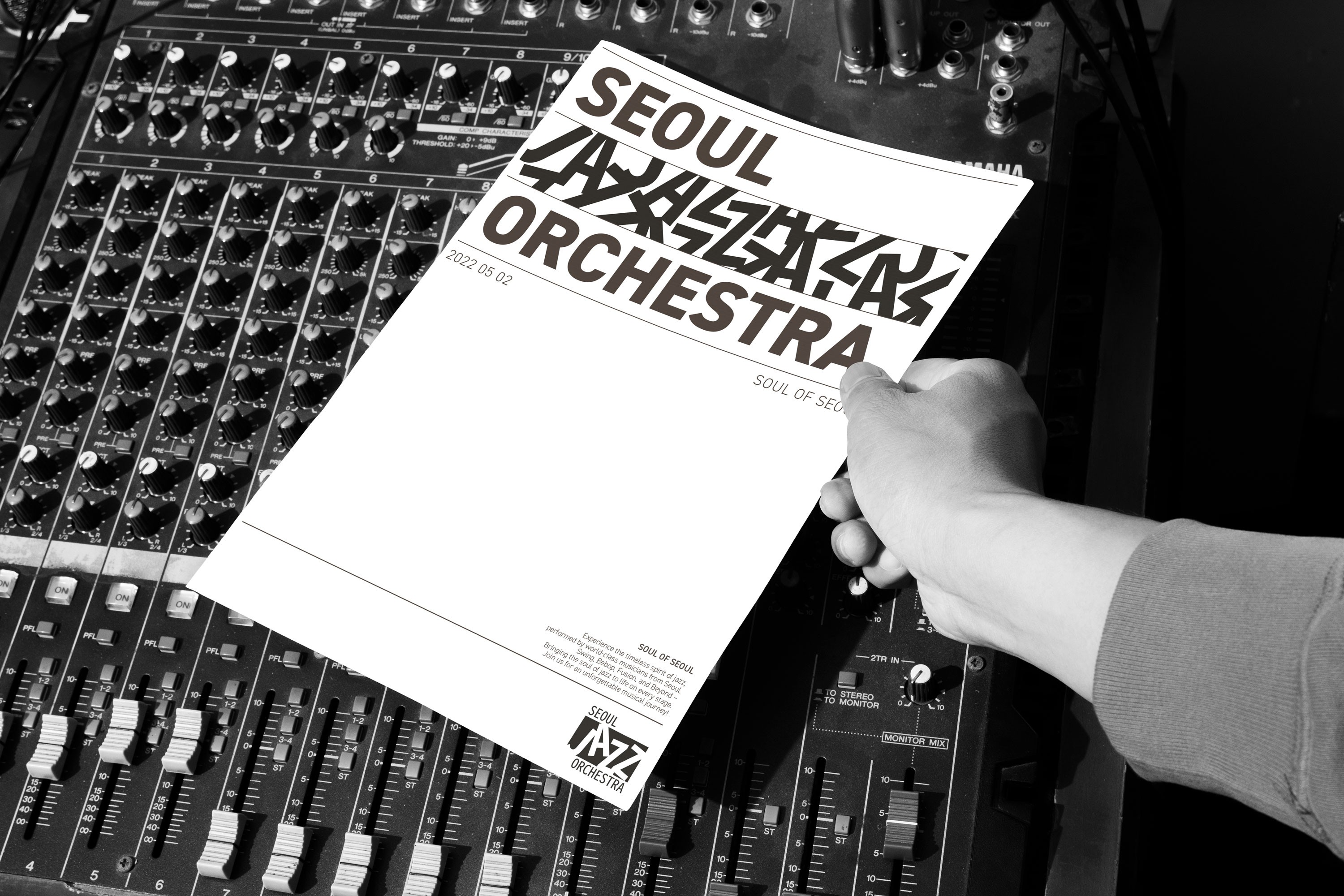 Graphic depicting a hexagonal cropped photo of an interior room design with grid lines along its borders.