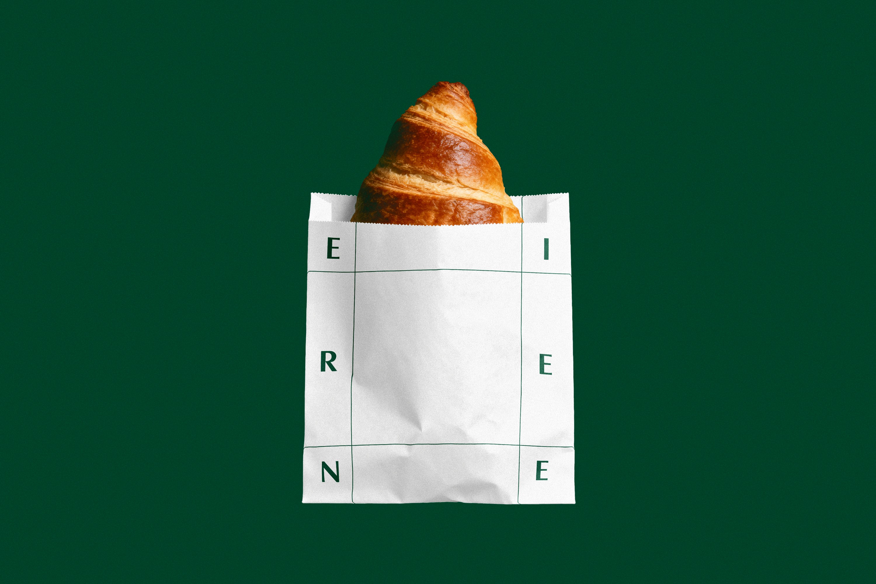 Graphic depicting a hexagonal cropped photo of an interior room design with grid lines along its borders.